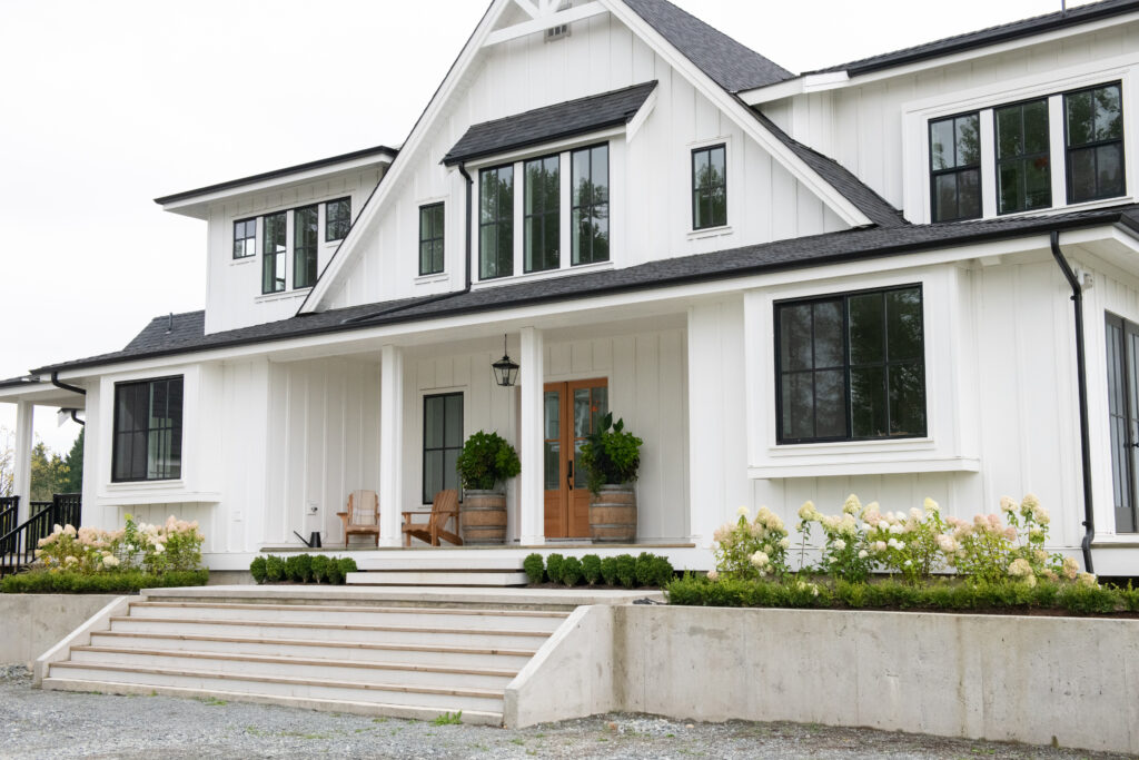 a beautiful custom home with columns built by C4 Builders